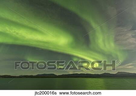 Aurora borealis over Fish Lake, Yukon, Canada. View Large Photo Image Stock Photograph - Aurora borealis over Fish Lake, Yukon, Canada.. Fotosearch