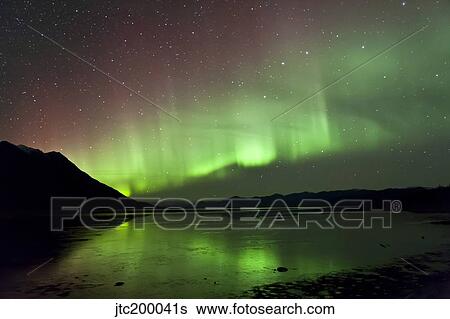 Stock Photograph - Aurora Borealis over Kluane Lake, Yukon, Canada.. Fotosearch