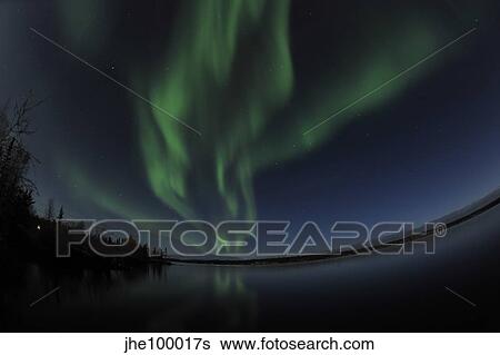 Aurora borealis over Long Lake, Northwest Territories, Canada. View Large Photo Image Stock Photograph - Aurora borealis over Long Lake, Northwest Territories, Canada.. Fotosearch