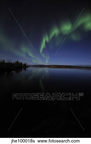 Aurora borealis over Long Lake, Northwest Territories, Canada. View Large Photo Image Stock Photograph - Aurora borealis over Long Lake, Northwest Territories, Canada.. Fotosearch