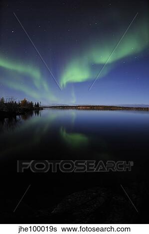 Aurora borealis over Long Lake, Northwest Territories, Canada. View Large Photo Image Stock Photograph - Aurora borealis over Long Lake, Northwest Territories, Canada.. Fotosearch