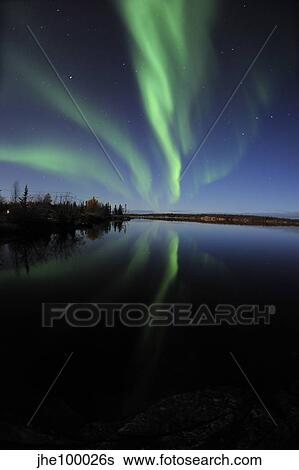 Aurora borealis over Long Lake, Northwest Territories, Canada. View Large Photo Image Stock Photograph - Aurora borealis over Long Lake, Northwest Territories, Canada.. Fotosearch