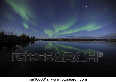Aurora borealis over Long Lake, Northwest Territories, Canada. View Large Photo Image Stock Photograph - Aurora borealis over Long Lake, Northwest Territories, Canada.. Fotosearch