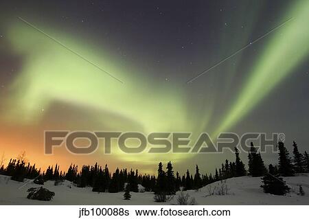 Aurora borealis over Ogilvie Mountains, Dempster Highway, Yukon, Canada. View Large Photo Image Stock Photograph - Aurora borealis over Ogilvie Mountains, Dempster Highway, Yukon, Canada.. Fotosearch