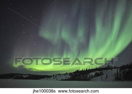 Stock Photograph - Aurora borealis over Prosperous Lake, Canada.. Fotosearch