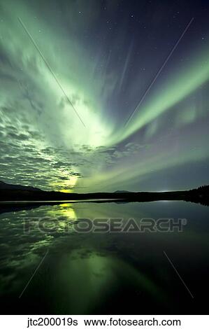 Aurora borealis over Schwatka Lake, Yukon, Canada. View Large Photo Image Stock Photograph - Aurora borealis over Schwatka Lake, Yukon, Canada.. Fotosearch