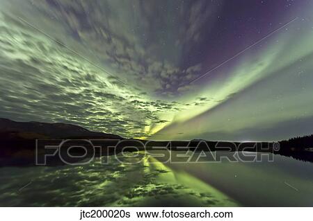 Aurora borealis over Schwatka Lake, Yukon, Canada. View Large Photo Image Stock Photograph - Aurora borealis over Schwatka Lake, Yukon, Canada.. Fotosearch