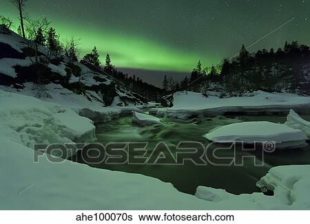 Aurora Borealis over Tennevik River, Troms, Norway View Large Photo Image Stock Photograph - Aurora Borealis over Tennevik River, Troms, Norway. Fotosearch