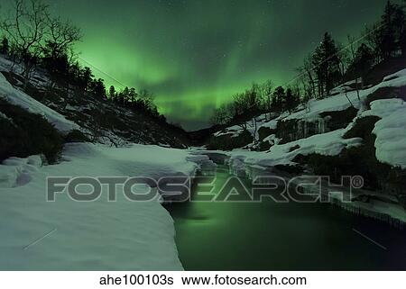 Aurora Borealis over Tennevik River, Troms, Norway. View Large Photo Image Stock Photograph - Aurora Borealis over Tennevik River, Troms, Norway.. Fotosearch