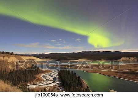 Aurora borealis over the Yukon River, Whitehorse, Yukon, Canada. View Large Photo Image Stock Photograph - Aurora borealis over the Yukon River, Whitehorse, Yukon, Canada.. Fotosearch