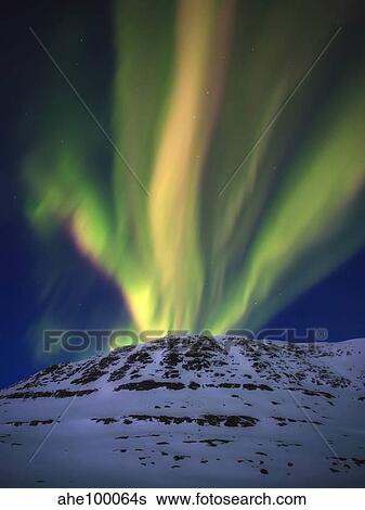 Aurora Borealis over Toviktinden Mountain in Troms County, Norway. View Large Photo Image Stock Photograph - Aurora Borealis over Toviktinden Mountain in Troms County, Norway.. Fotosearch