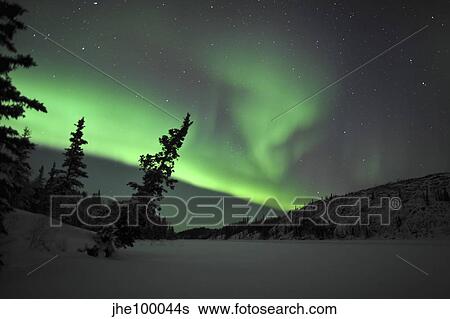 Aurora Borealis over Vee Lake, Northwest Territories, Canada. View Large Photo Image Stock Photograph - Aurora Borealis over Vee Lake, Northwest Territories, Canada.. Fotosearch