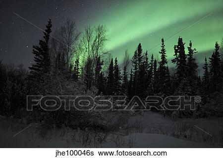 Stock Photograph - Aurora Borealis over Vee Lake, Northwest Territories, Canada.. Fotosearch