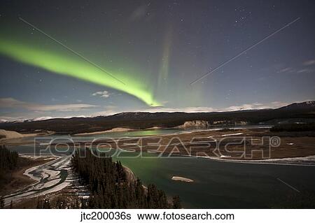 Aurora borealis over Yukon River, Yukon, Canda. View Large Photo Image Stock Photograph - Aurora borealis over Yukon River, Yukon, Canda.. Fotosearch
