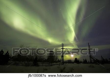Aurora borealis with moon and gate, Whitehorse, Yukon, Canada. View Large Photo Image Stock Photograph - Aurora borealis with moon and gate, Whitehorse, Yukon, Canada.. Fotosearch