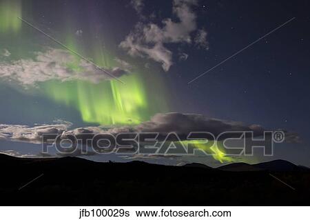 Aurora borealis with moonlight at Fish Lake, Yukon, Canada. View Large Photo Image Stock Photograph - Aurora borealis with moonlight at Fish Lake, Yukon, Canada.. Fotosearch
