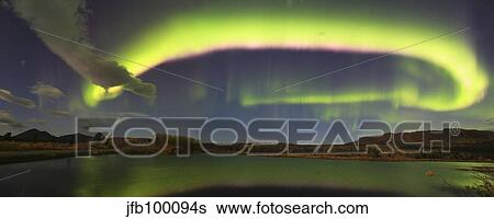 Aurora borealis with moonlight at Fish Lake, Whitehorse, Yukon, Canada. View Large Photo Image Stock Photograph - Aurora borealis with moonlight at Fish Lake, Whitehorse, Yukon, Canada.. Fotosearch
