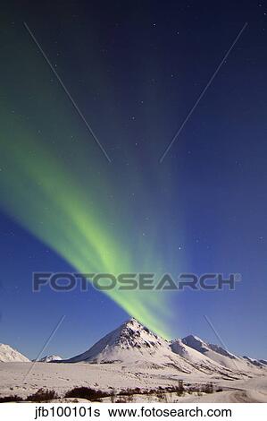 Aurora borealis with moonlight over Ogilvie Mountains, Canada. View Large Photo Image Stock Photograph - Aurora borealis with moonlight over Ogilvie Mountains, Canada.. Fotosearch
