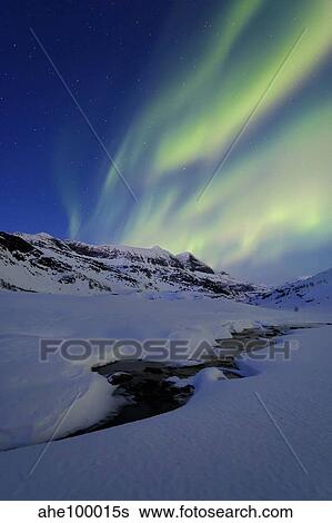 Aurora Over Skittendalstinden in Troms County, Norway. View Large Photo Image Stock Photograph - Aurora Over Skittendalstinden in Troms County, Norway.. Fotosearch