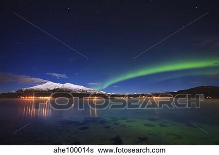 Aurora over Tjeldsundet and Saetertinden Mountain in Norway. View Large Photo Image Stock Photograph - Aurora over Tjeldsundet and Saetertinden Mountain in Norway.. Fotosearch