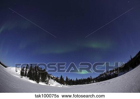 Stock Photograph - Aurora over Vee Lake, Yellowknife, Northwest Territories, Canada.. Fotosearch