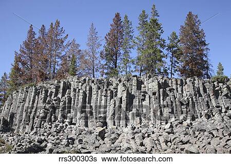Basalt Columns formed by cooling lava, Yellowstone National Park, Wyoming. View Large Photo Image Stock Photograph - Basalt Columns formed by cooling lava, Yellowstone National Park, Wyoming.. Fotosearch