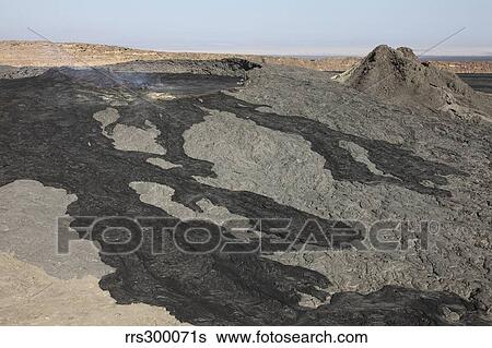 Stock Photograph - Basaltic lava flow from pit crater, Erta Ale volcano caldera, Danakil Depression, Ethiopia.. Fotosearch
