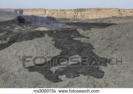 Stock Photograph - Basaltic lava flow from pit crater, Erta Ale volcano, Danakil Depression, Ethiopia.. Fotosearch