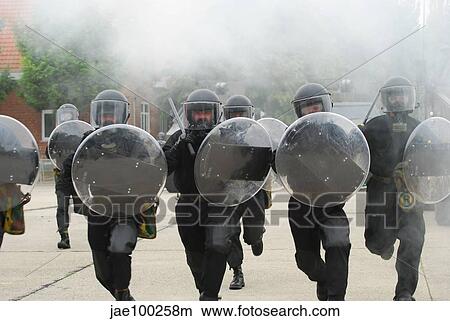 Belgian Infantry soldiers training in crowd and riot control. View Large Photo Image Picture - Belgian Infantry soldiers training in crowd and riot control.. Fotosearch