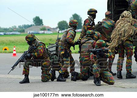 Belgian paracommandos entering the scene during an evacuation training session. View Large Photo Image Picture - Belgian paracommandos entering the scene during an evacuation training session.. Fotosearch