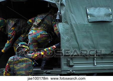 Belgian paracommandos entering the scene during an evacuation training session. View Large Photo Image Picture - Belgian paracommandos entering the scene during an evacuation training session.. Fotosearch