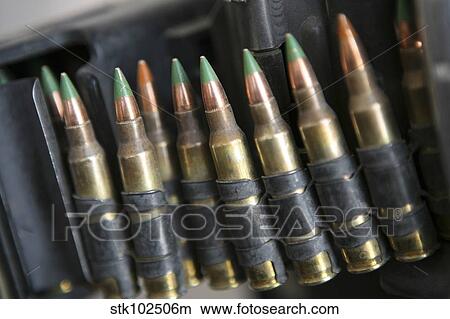 Belted bullets for an M-249 squad automatic weapon. View Large Photo Image Picture - Belted bullets for an M-249 squad automatic weapon.. Fotosearch