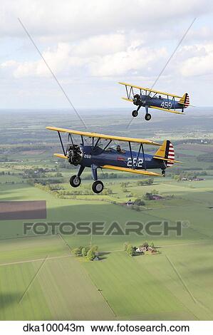 Boeing Stearman Model 75 Kaydet in U. S. Army colors. View Large Photo Image Picture - Boeing Stearman Model 75 Kaydet in U. S. Army colors.. Fotosearch
