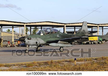 Brazilian Air Force A-29B Super Tucano taxiing at Natal Air Force Base. View Large Photo Image Picture - Brazilian Air Force A-29B Super Tucano taxiing at Natal Air Force Base.. Fotosearch