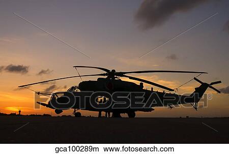 Brazilian Air Force Mi-35 at sunset at Natal Air Force Base, Brazil. View Large Photo Image Picture - Brazilian Air Force Mi-35 at sunset at Natal Air Force Base, Brazil.. Fotosearch