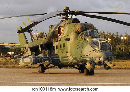 Brazilian Air Force Mil Mi-35 combat helicopter at sunset. View Large Photo Image Picture - Brazilian Air Force Mil Mi-35 combat helicopter at sunset.. Fotosearch