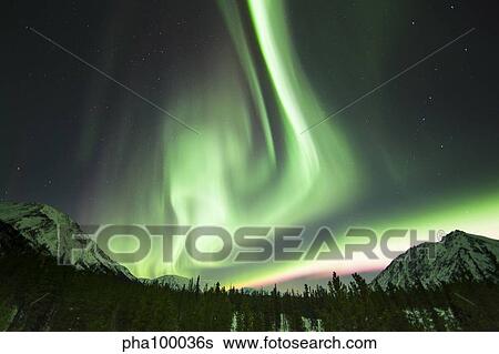 Bright aurora borealis, Annie Lake, Yukon, Canada. View Large Photo Image Stock Photograph - Bright aurora borealis, Annie Lake, Yukon, Canada.. Fotosearch