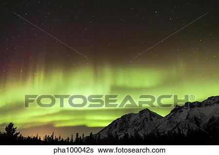 Bright aurora borealis, Annie Lake, Yukon, Canada. View Large Photo Image Stock Photograph - Bright aurora borealis, Annie Lake, Yukon, Canada.. Fotosearch