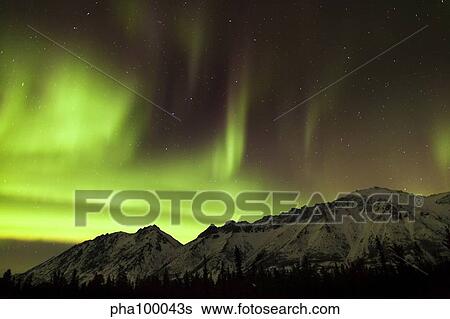 Bright aurora borealis, Annie Lake, Yukon, Canada. View Large Photo Image Stock Photograph - Bright aurora borealis, Annie Lake, Yukon, Canada.. Fotosearch
