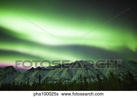 Bright aurora borealis over Annie Lake, Yukon, Canada. View Large Photo Image Stock Photograph - Bright aurora borealis over Annie Lake, Yukon, Canada.. Fotosearch