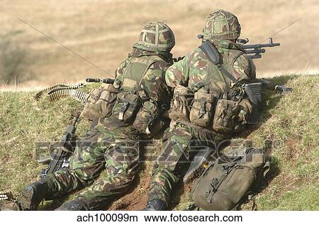 Picture - British Army soldiers participate in sustained fire training.. Fotosearch