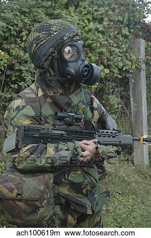 British soldier in full NBC protection gear and a S6 respirator. View Large Photo Image Picture - British soldier in full NBC protection gear and a S6 respirator.. Fotosearch