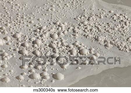 Bubbles on surface of Sulphur Cauldron hot spring, Yellowstone National Park, Wyoming. View Large Photo Image Stock Photograph - Bubbles on surface of Sulphur Cauldron hot spring, Yellowstone National Park, Wyoming.. Fotosearch