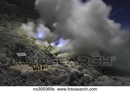 Burning sulphur in mining area on Kawah Ijen Volcano, Java, Indonesia. View Large Photo Image Stock Photograph - Burning sulphur in mining area on Kawah Ijen Volcano, Java, Indonesia.. Fotosearch