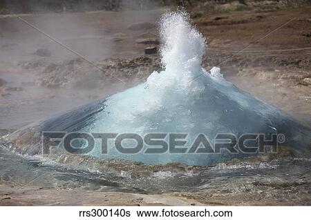 Stock Photograph - Bursting water bubble at onset of eruption of Strokkur Geysir, Iceland.. Fotosearch