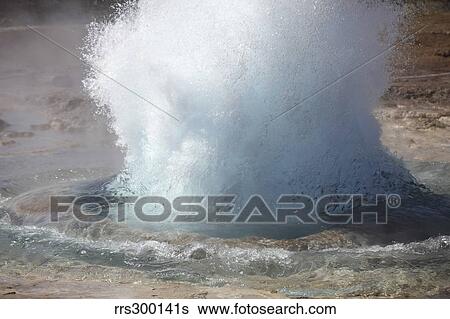 Stock Photograph - Bursting water bubble at onset of eruption of Strokkur Geysir, Iceland.. Fotosearch