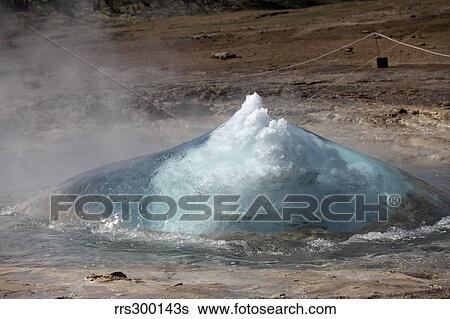 Bursting water bubble at onset of eruption of Strokkur Geysir, Iceland. View Large Photo Image Stock Photograph - Bursting water bubble at onset of eruption of Strokkur Geysir, Iceland.. Fotosearch