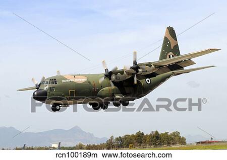 C-130 Hercules from the Hellenic Air Force landing at Decimomannu Air Base, Italy. View Large Photo Image Picture - C-130 Hercules from the Hellenic Air Force landing at Decimomannu Air Base, Italy.. Fotosearch