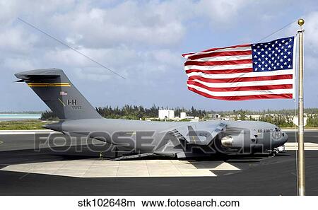 C-17 Globemaster III sits on the flightline at Wake Island. View Large Photo Image Picture - C-17 Globemaster III sits on the flightline at Wake Island.. Fotosearch