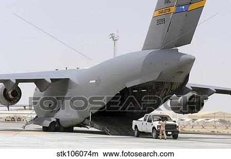 C-17s deliver, pick-up cargo at Southwest Asia base View Large Photo Image Picture - C-17s deliver, pick-up cargo at Southwest Asia base. Fotosearch